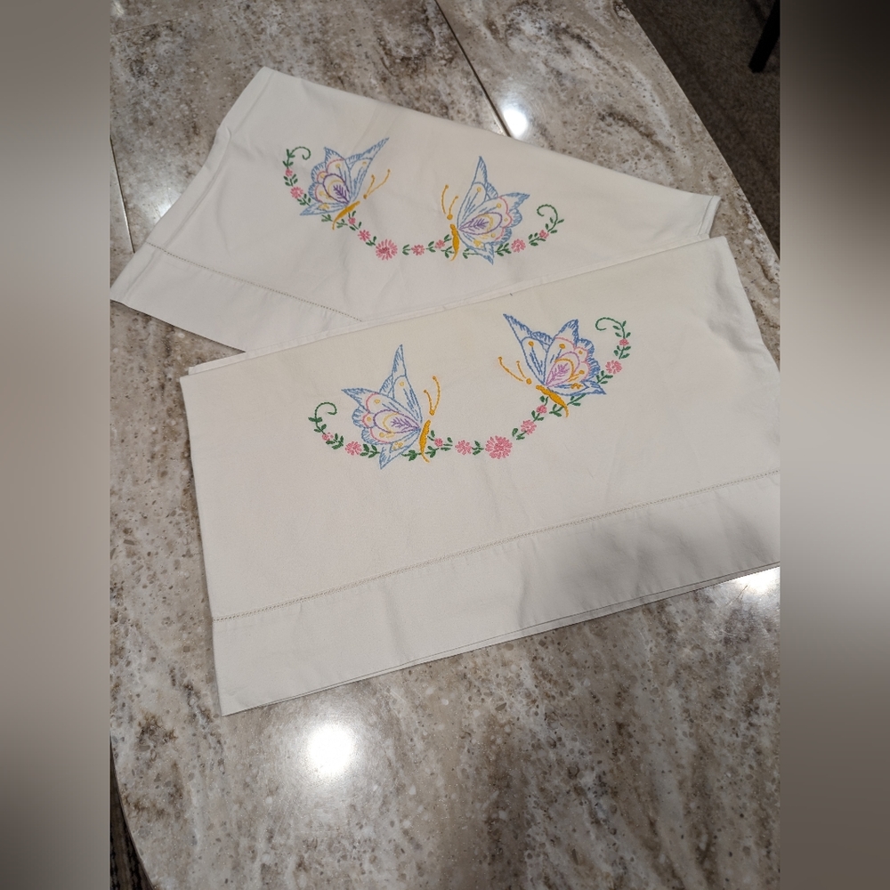 - 2 Hand embroidery pillow cases.